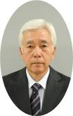 委員 前田 良行さんの上半身の顔写真